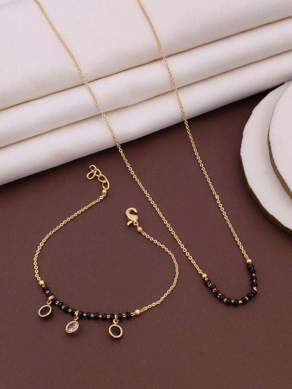 Designer Mangalsutra & Bracelet for Women